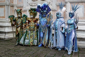The parade of people in costume at the 2026 Venice Carnival in front of the Church of San Zaccaria.