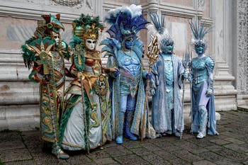 The parade of people in costume at the 2026 Venice Carnival in front of the Church of San Zaccaria.