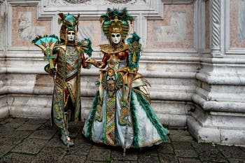 The parade of people in costume at the 2026 Venice Carnival in front of the Church of San Zaccaria.