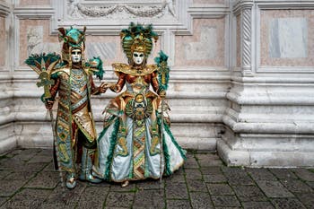 The parade of people in costume at the 2026 Venice Carnival in front of the Church of San Zaccaria.