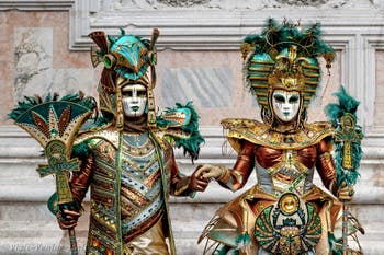 The parade of people in costume at the 2026 Venice Carnival in front of the Church of San Zaccaria.