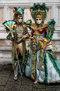 The parade of people in costume at the 2026 Venice Carnival in front of the Church of San Zaccaria.