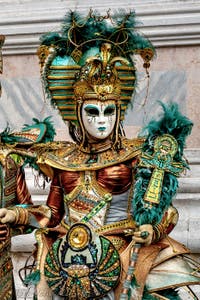 The parade of people in costume at the 2026 Venice Carnival in front of the Church of San Zaccaria.
