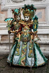 The parade of people in costume at the 2026 Venice Carnival in front of the Church of San Zaccaria.