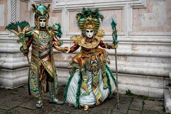 The parade of people in costume at the 2026 Venice Carnival in front of the Church of San Zaccaria.