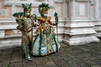 The parade of people in costume at the 2026 Venice Carnival in front of the Church of San Zaccaria.