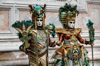 The parade of people in costume at the 2026 Venice Carnival in front of the Church of San Zaccaria.