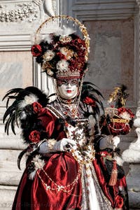 The parade of people in costume at the 2026 Venice Carnival in front of the Church of San Zaccaria.