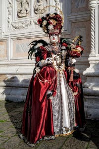 The parade of people in costume at the 2026 Venice Carnival in front of the Church of San Zaccaria.