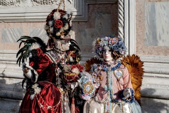 Venice carnival costumed figures
