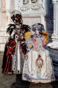 The parade of people in costume at the 2026 Venice Carnival in front of the Church of San Zaccaria.