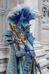 The parade of people in costume at the 2026 Venice Carnival in front of the Church of San Zaccaria.