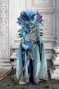 The parade of people in costume at the 2026 Venice Carnival in front of the Church of San Zaccaria.