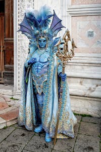 The parade of people in costume at the 2026 Venice Carnival in front of the Church of San Zaccaria.