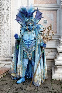 The parade of people in costume at the 2026 Venice Carnival in front of the Church of San Zaccaria.