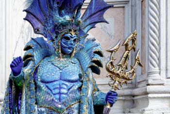 Venice carnival costumed figures