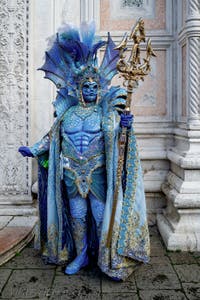 The parade of people in costume at the 2026 Venice Carnival in front of the Church of San Zaccaria.