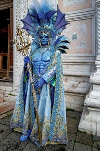 The parade of people in costume at the 2026 Venice Carnival in front of the Church of San Zaccaria.