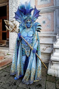 The parade of people in costume at the 2026 Venice Carnival in front of the Church of San Zaccaria.