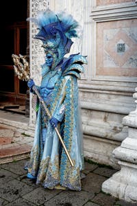 The parade of people in costume at the 2026 Venice Carnival in front of the Church of San Zaccaria.