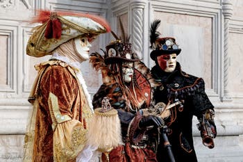 The parade of people in costume at the 2026 Venice Carnival in front of the Church of San Zaccaria.