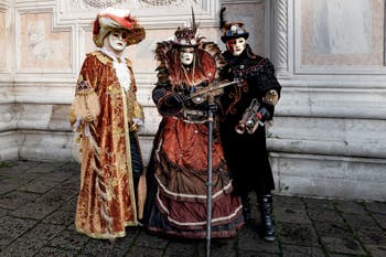 The parade of people in costume at the 2026 Venice Carnival in front of the Church of San Zaccaria.