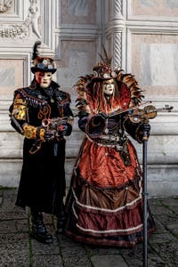 The parade of people in costume at the 2026 Venice Carnival in front of the Church of San Zaccaria.