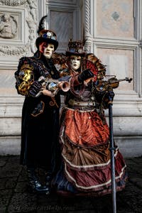 The parade of people in costume at the 2026 Venice Carnival in front of the Church of San Zaccaria.