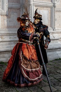 The parade of people in costume at the 2026 Venice Carnival in front of the Church of San Zaccaria.