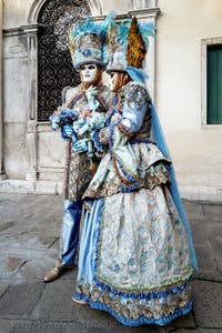 The parade of people in costume at the 2026 Venice Carnival in front of the Church of San Zaccaria.