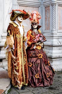 The parade of people in costume at the 2026 Venice Carnival in front of the Church of San Zaccaria.