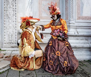 The parade of people in costume at the 2026 Venice Carnival in front of the Church of San Zaccaria.