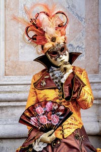 The parade of people in costume at the 2026 Venice Carnival in front of the Church of San Zaccaria.