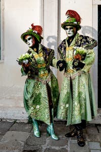 The parade of people in costume at the 2026 Venice Carnival in front of the Church of San Zaccaria.