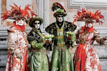The parade of people in costume at the 2026 Venice Carnival in front of the Church of San Zaccaria.