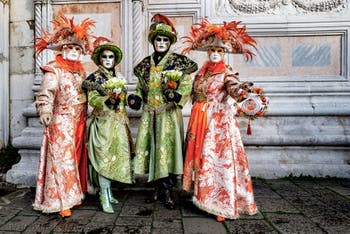 The parade of people in costume at the 2026 Venice Carnival in front of the Church of San Zaccaria.