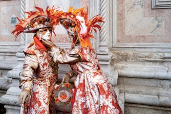 The parade of people in costume at the 2026 Venice Carnival in front of the Church of San Zaccaria.