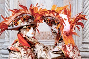 The parade of people in costume at the 2026 Venice Carnival in front of the Church of San Zaccaria.