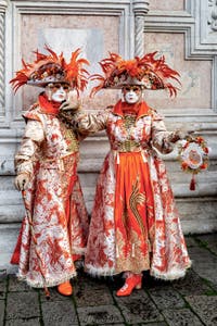 The parade of people in costume at the 2026 Venice Carnival in front of the Church of San Zaccaria.