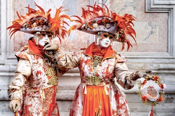The parade of people in costume at the 2026 Venice Carnival in front of the Church of San Zaccaria.