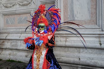 The parade of people in costume at the 2026 Venice Carnival in front of the Church of San Zaccaria.