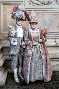 The parade of people in costume at the 2026 Venice Carnival in front of the Church of San Zaccaria.