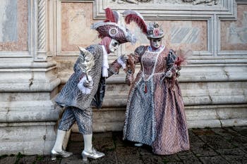 The parade of people in costume at the 2026 Venice Carnival in front of the Church of San Zaccaria.