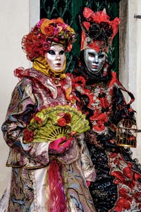 The parade of people in costume at the 2026 Venice Carnival in front of the Church of San Zaccaria.