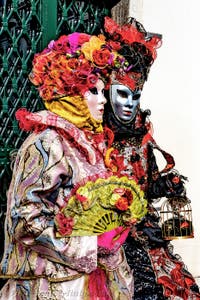 The parade of people in costume at the 2026 Venice Carnival in front of the Church of San Zaccaria.