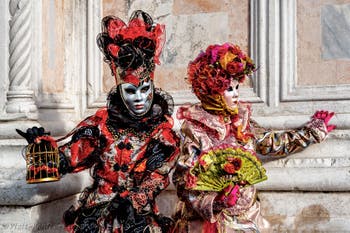 The parade of people in costume at the 2026 Venice Carnival in front of the Church of San Zaccaria.