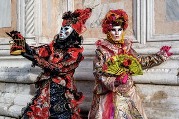 Venice carnival costumed figures