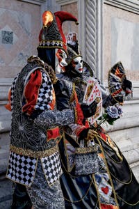 The parade of people in costume at the 2026 Venice Carnival in front of the Church of San Zaccaria.