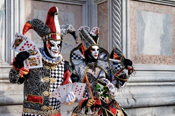 The parade of people in costume at the 2026 Venice Carnival in front of the Church of San Zaccaria.