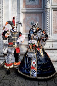 The parade of people in costume at the 2026 Venice Carnival in front of the Church of San Zaccaria.